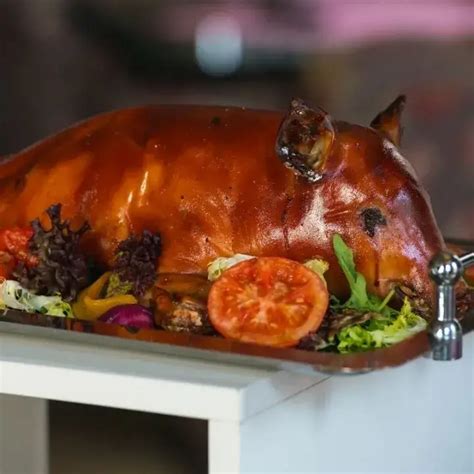 Whole Roasted Pig / Lechon Asado & BBQ 